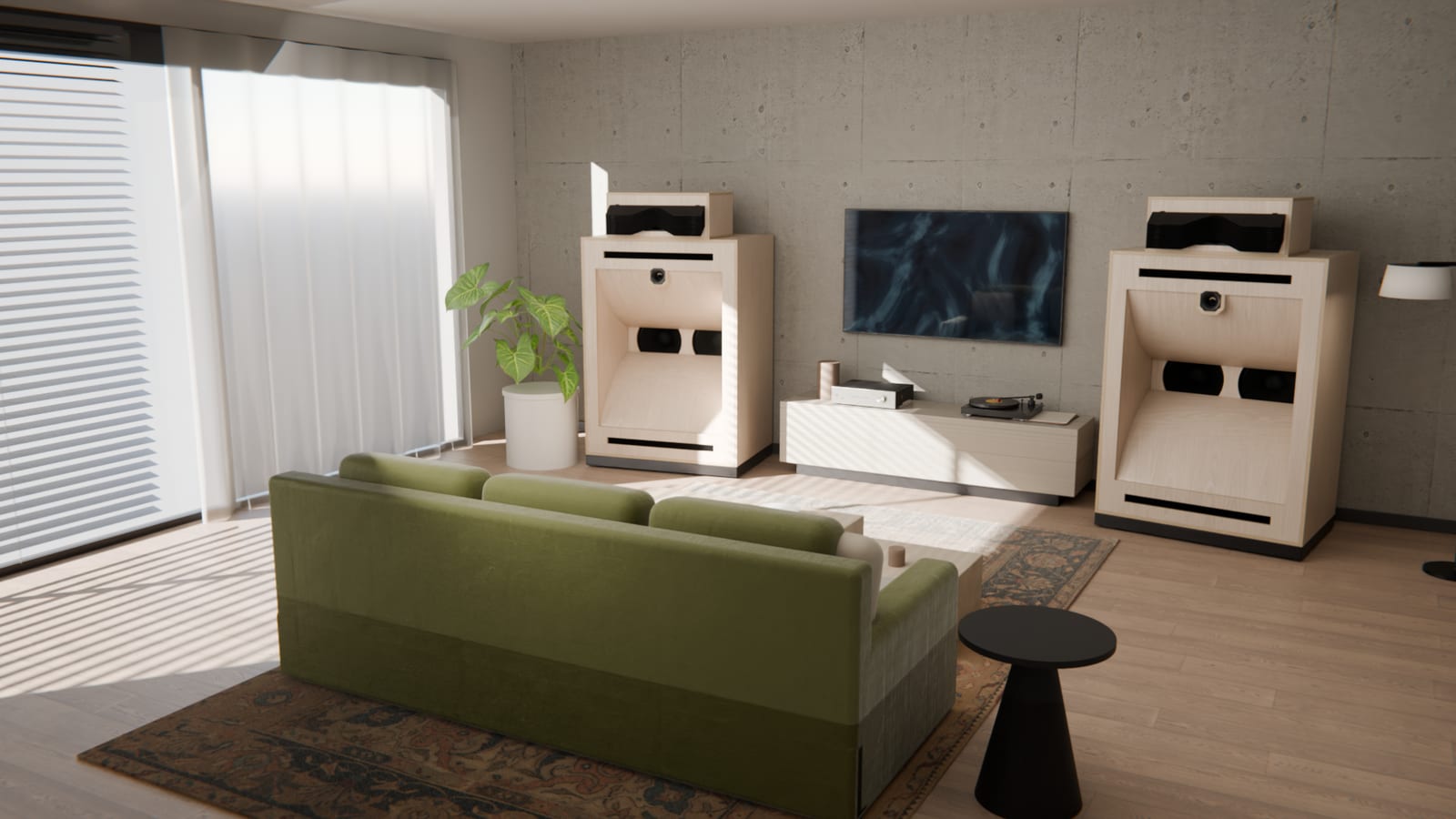 A pair of SA1 loudspeakers either side of a media unit in a living room
