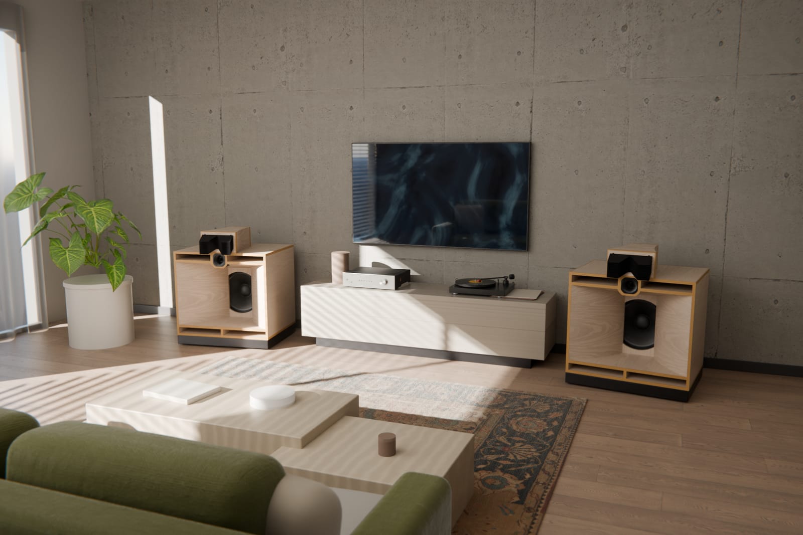 A pair of SA3 loudspeakers either side of a media unit in a living room