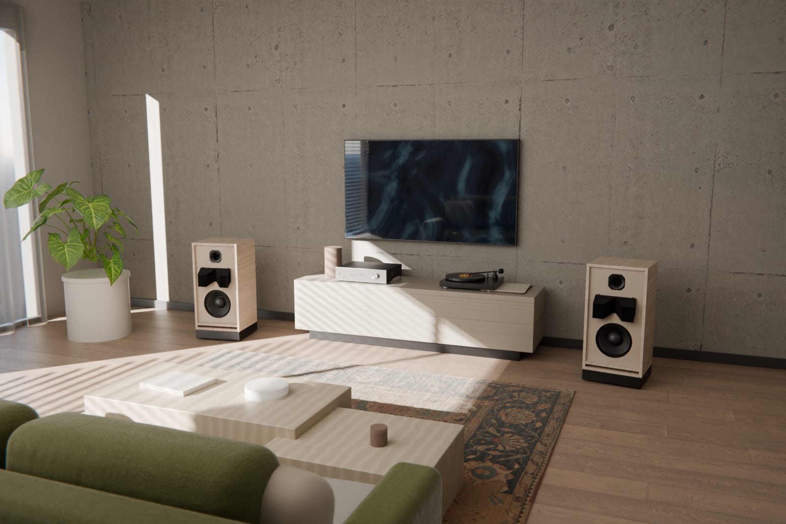 A pair of SA4 loudspeakers either side of a media unit in a living room